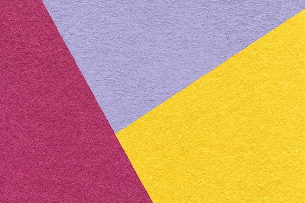 Texture of craft purple yellow and violet shade color paper background macro Structure of vintage abstract cardboard