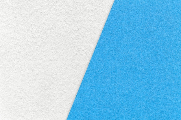 Texture of craft white and light blue paper background half two colors Vintage kraft cerulean cardboard