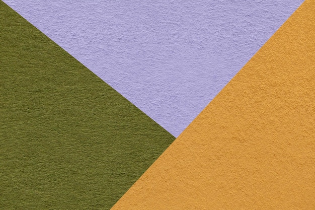 Texture of craft yellow green and lilac shade color paper background macro Vintage abstract cardboard