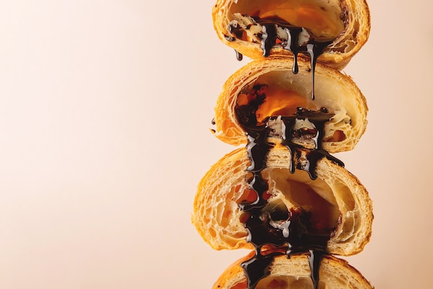 Texture of crispy puff croissants with liquid flowing chocolate