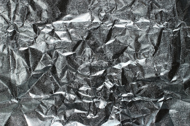 The texture of crumpled silver paper