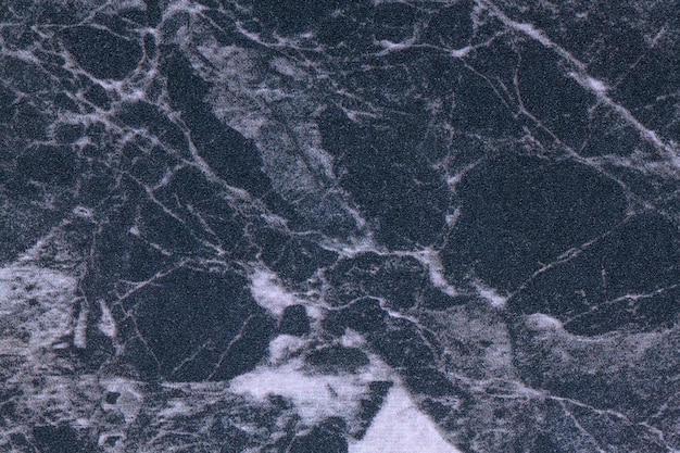 Texture of dark blue and gray marble, macro background.