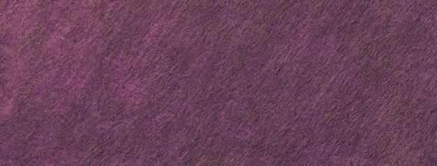 Photo texture dark purple background from felt textile material macro vintage violet fabric cloth