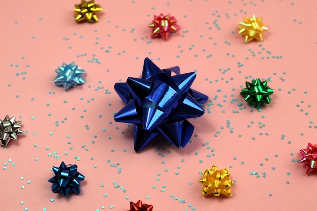 The texture of the festive wrapping of bows of different sizes and colors