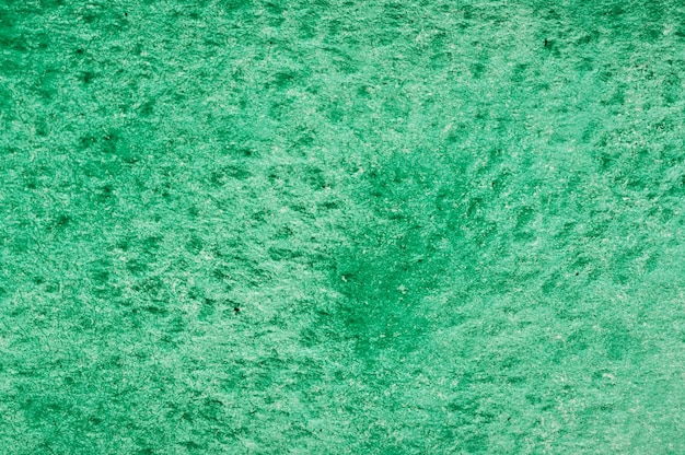 Texture from green watercolor stains on paper