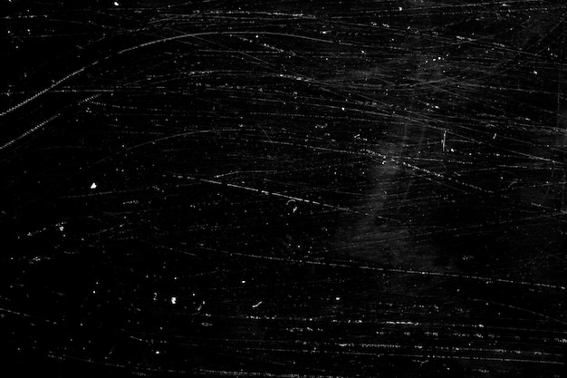 The texture is black with scratches. grunge background