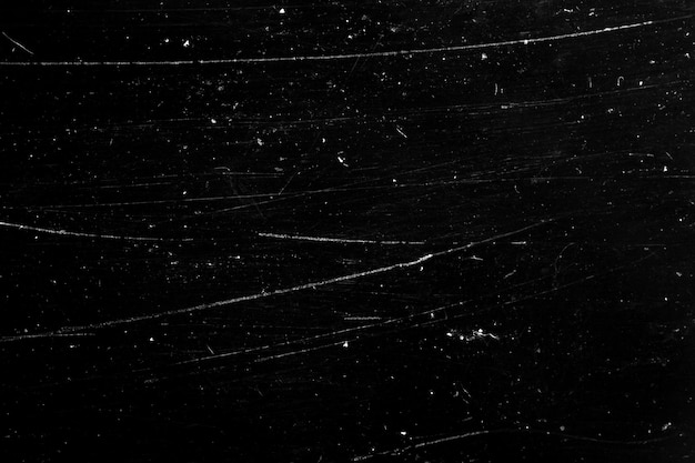 The texture is black with scratches. grunge background