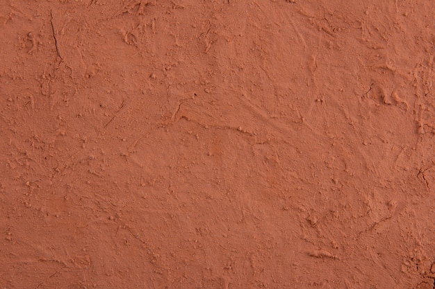 Photo texture of land dried up by drought. the ground cracks background.