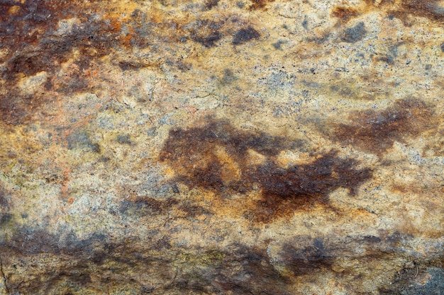 texture of natural brown stone with cracks and strokes