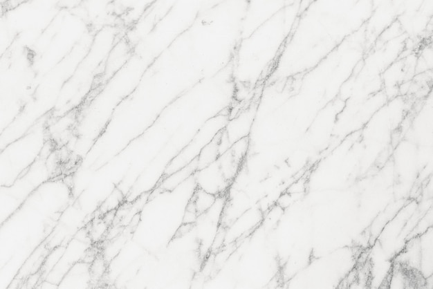 The texture of natural white marble made of natural tiles is a luxurious background for design works