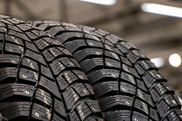 Texture of a new winter tires for car closeup.