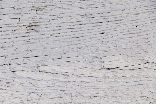 Texture of old cracked paint on wooden boards.