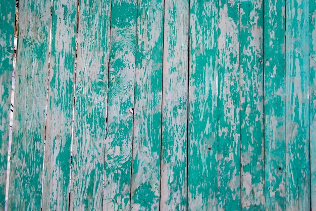 Texture of old cracked paint on wooden boards.