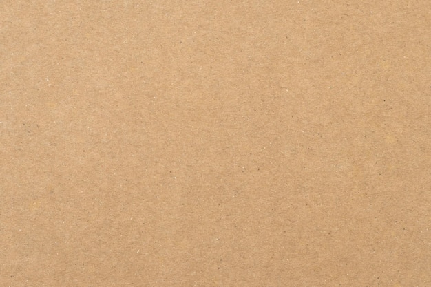 Texture of old paper brown background Yellow packaging vintage dirty page Craft sheet natural pattern of papyrus Carton container surface close up