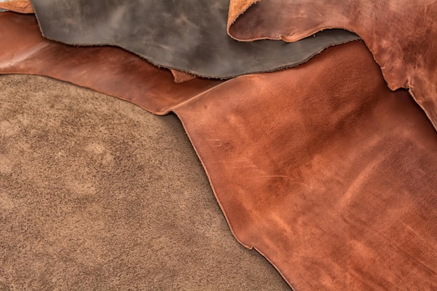 Texture of pieces brown leather Natural material background