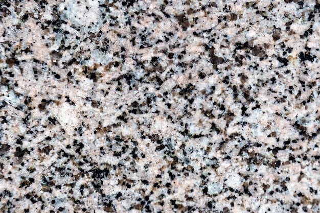 Texture of polished granite stone. Abstract background