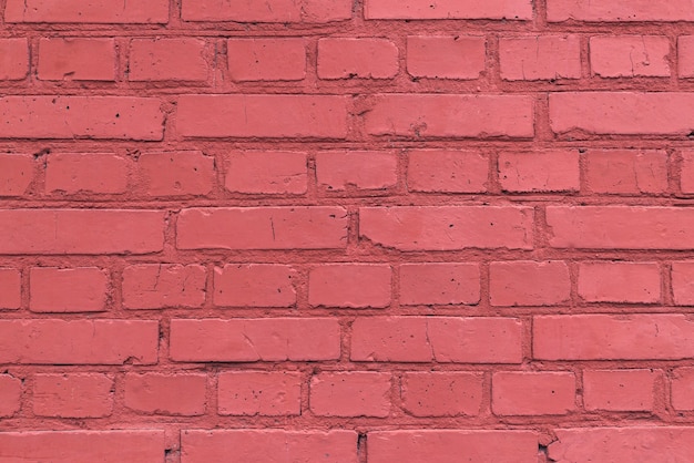 Texture of a red brick wall of a house.