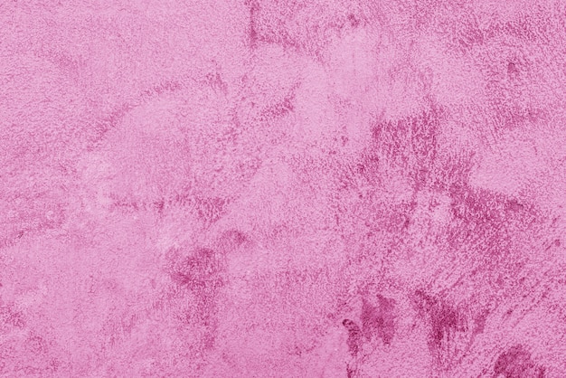 Texture of rough pink plaster. Architectural abstract background.