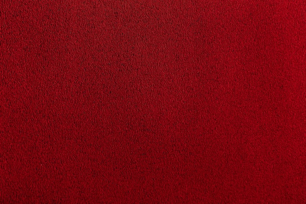 Texture sheet of scarlet paper. Bordo Dark Smooth Surface. Abstract red background.