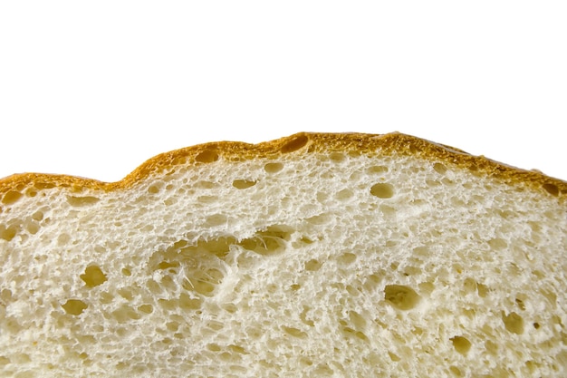 Texture of slice of freshly baked wheat bread close up