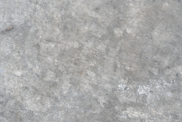 Texture of a smooth white concrete wall with cracks as a background or wallpaper. Gray concrete wall abstract background clear and smooth texture grunge polished cement outdoor