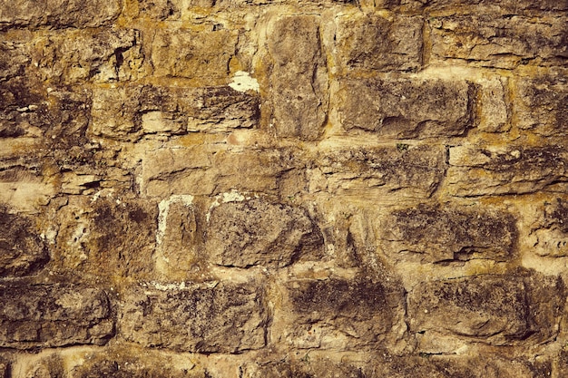 Texture of a stone wall Old castle stone wall texture background Stone wall as a background or texture Part of a stone wall for background or texture