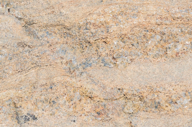 Texture of the stone with various impregnations.