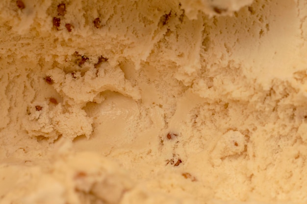 Texture surface of vanilla ice cream with nut Background of ice cream