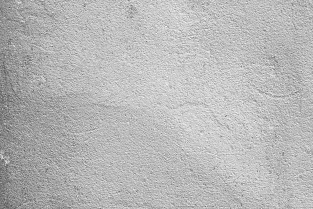 Texture, wall, concrete background. Wall fragment with scratches and cracks background