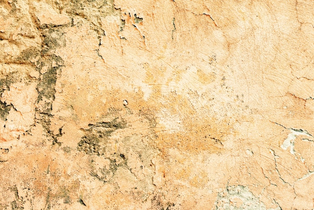 Texture, wall, concrete background. Wall fragment with scratches and cracks