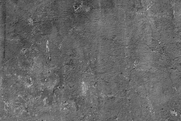 Texture, wall, concrete background. Wall fragment with scratches and cracks