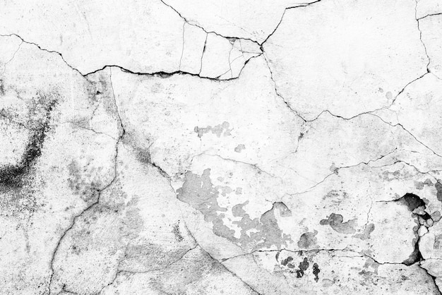 Texture, wall, concrete background. Wall fragment with scratches and cracks