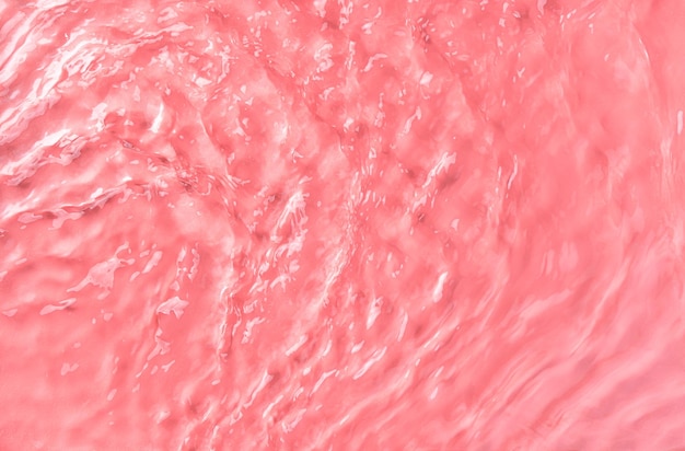 The texture of waves on rose water in sunlight Spa background