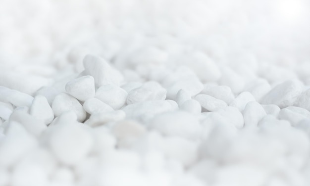 Texture of the white gravel stone or round pebbles