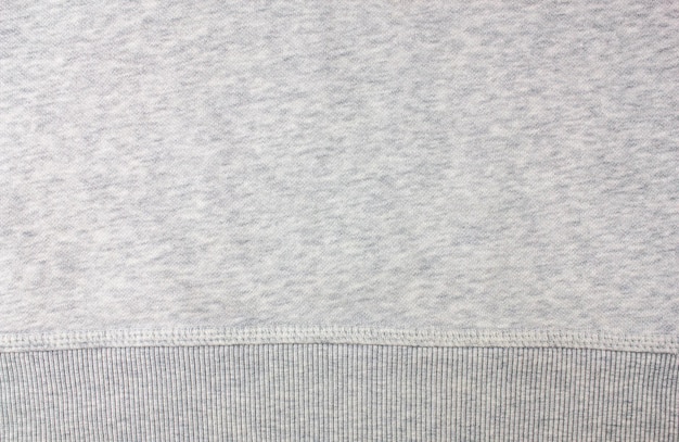 Texture of white gray hoodie sweatshirt White sweatshirt fabric texture