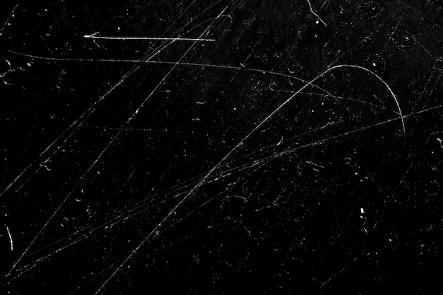 Texture with scratches on a black background.