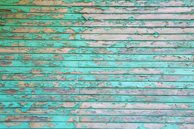 Texture wooden background with old cracked blue paint