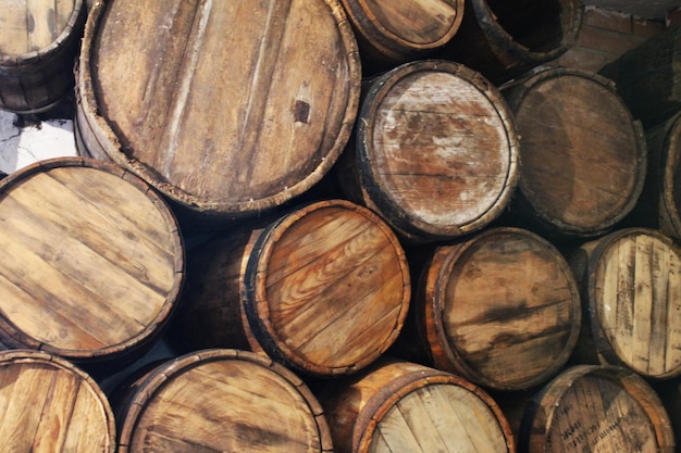 Texture of wooden barrels of the wine cellar wall