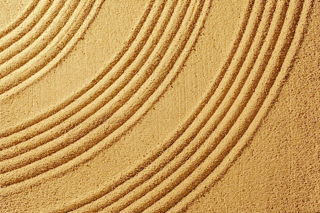 Texture yellow sand summer day and smooth lines