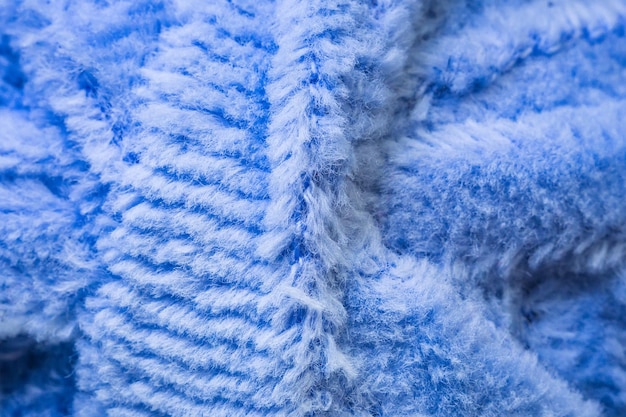 Textured blue fabric macro background closeup texture