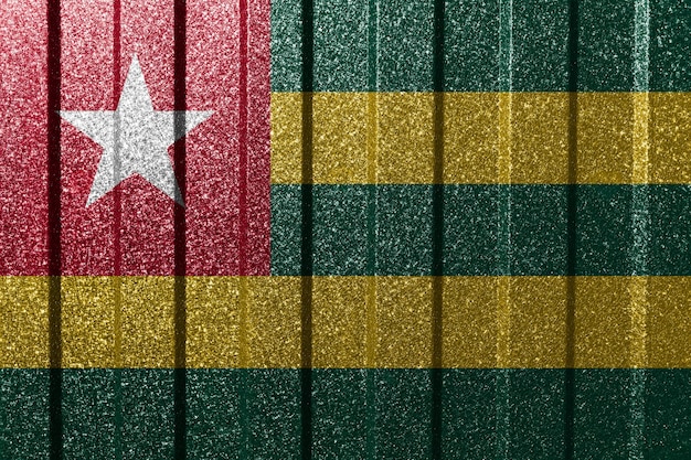 Textured flag of Togo on metal wall Colorful natural abstract geometric background with lines