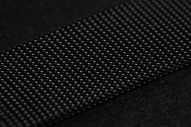 textured metal surface in dark gray color, background