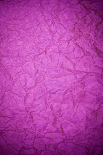 Textured paper purple background.