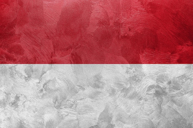 Textured photo of the flag of Monaco