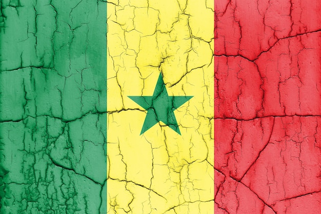 Textured photo of the flag of Senegal with cracks