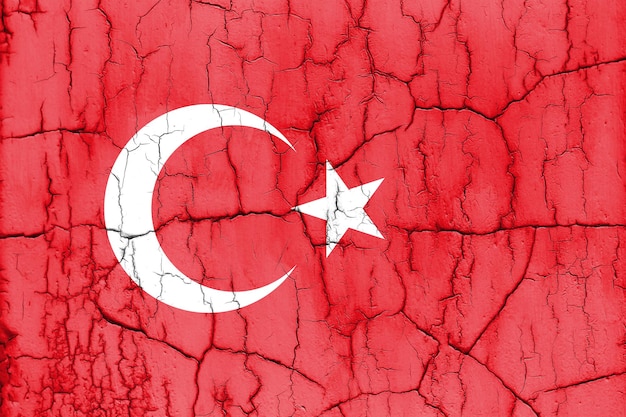 Textured photo of the flag of Turkey with cracks