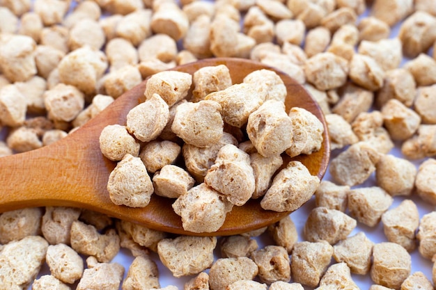 Textured soy protein on white background