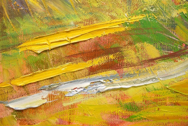 Textured yellow painted brush strokes background