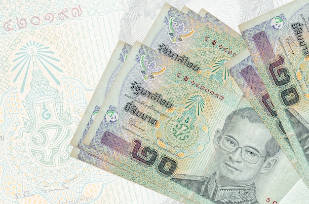 Thai Baht bills on a light background