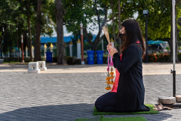 Thai buddhism pray for benefaction worship